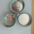 Mini stainless steel egg steamer for creating heart-shaped and round boiled eggs.