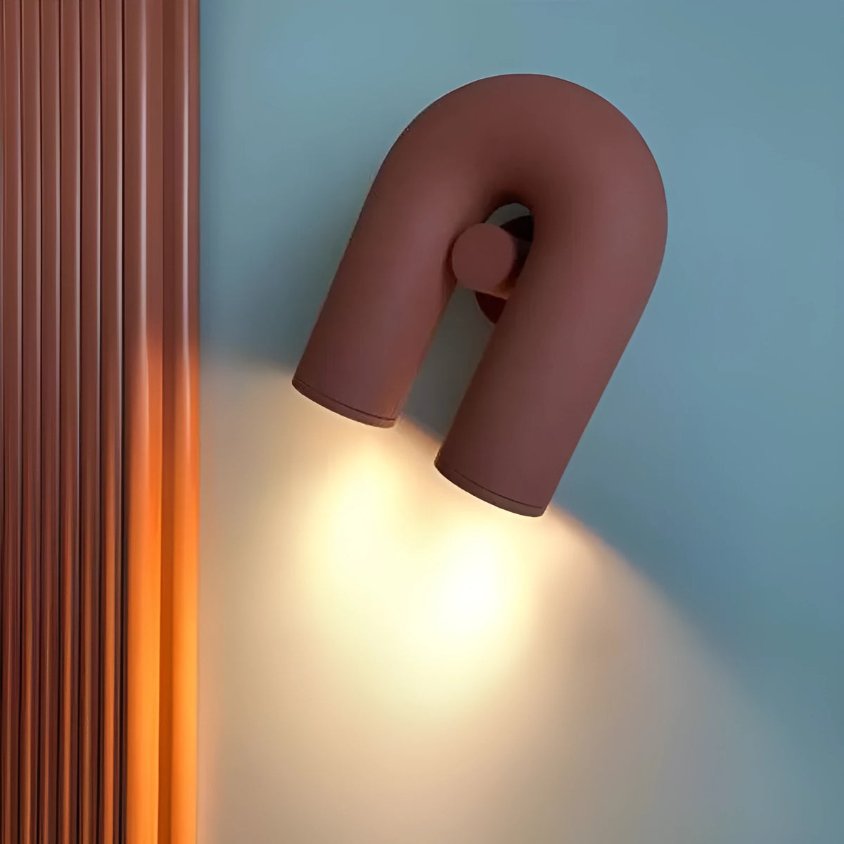 Macaron U-shaped creative wall lamp in orange, blue, grey, or black with 220V voltage and three-colour light source