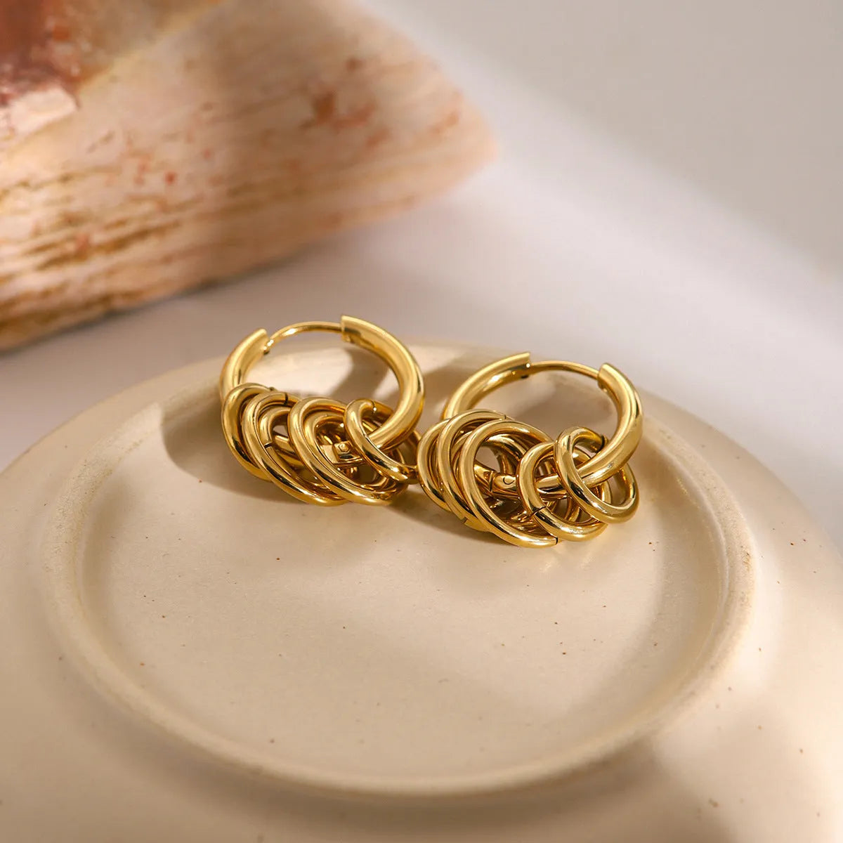 Pair of modern stainless steel earrings with electroplated colour finish in unisex ins style.