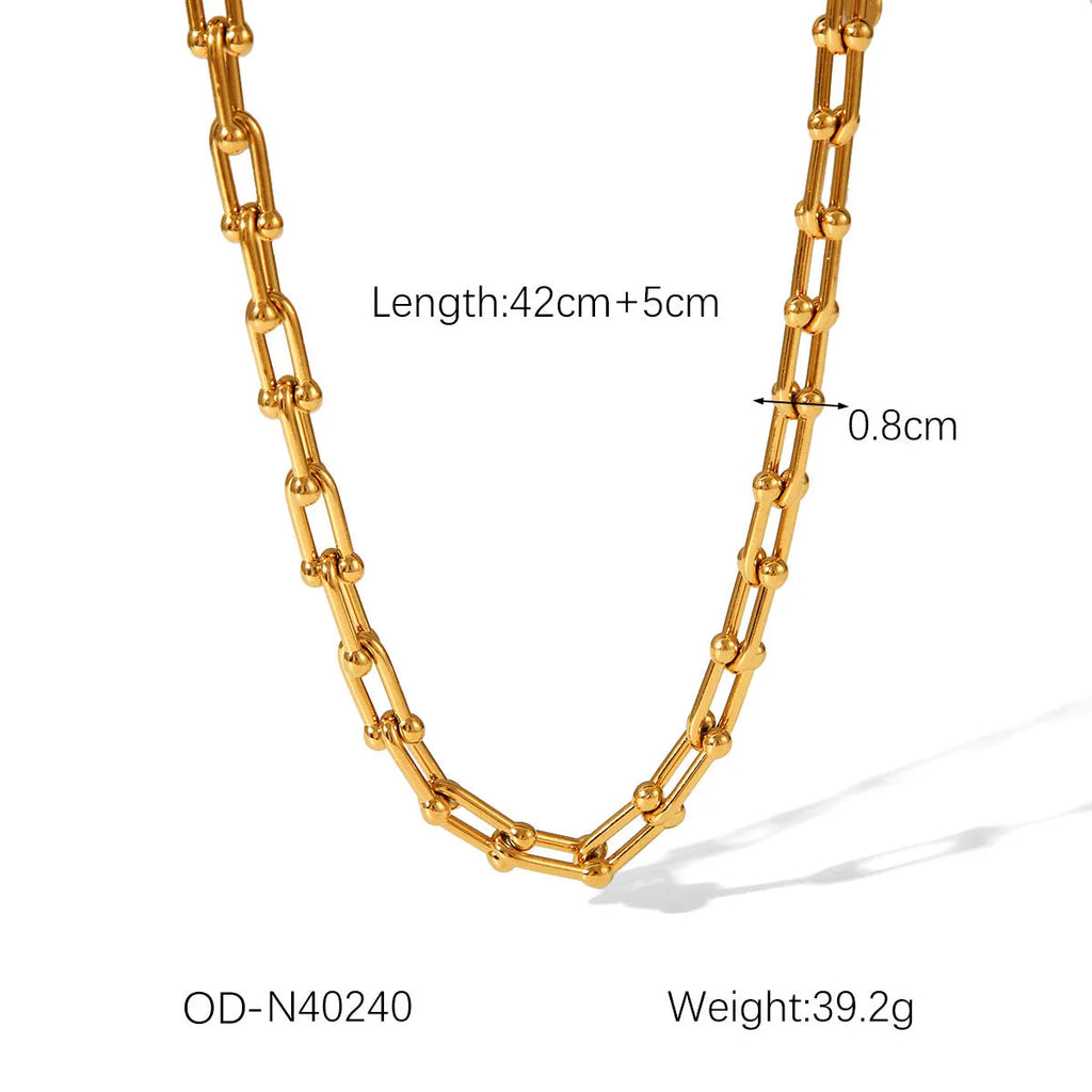 Stainless steel necklace, bracelet, and earring set with a titanium steel horseshoe pendant.