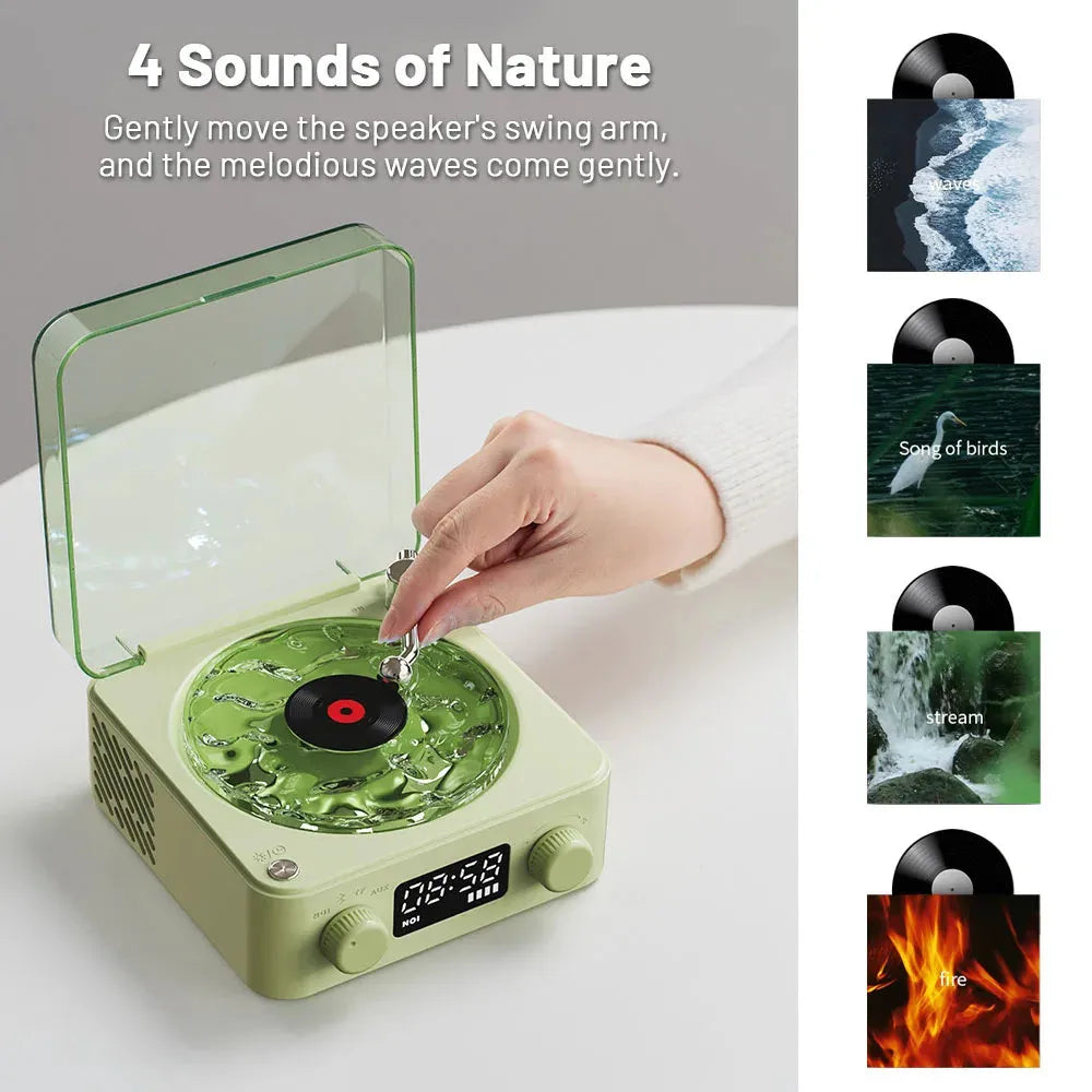 Retro turntable Bluetooth speaker with rotating vinyl and RGB projection lighting effects