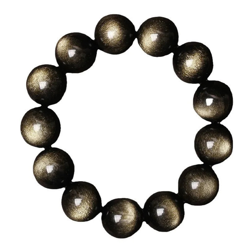 Hand-woven round obsidian crystal bracelet in black, silver, and rainbow eye colours on a neutral background.