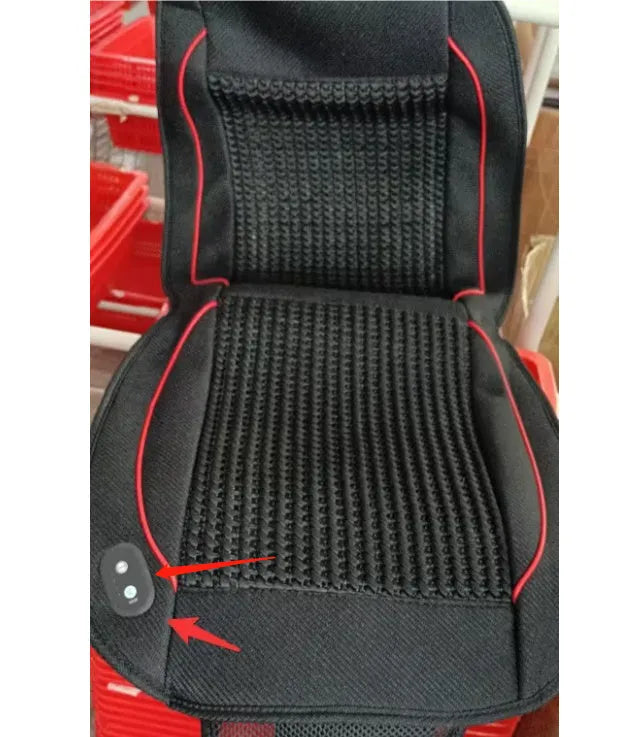 Black car ventilation seat cushion with power cord on car seat measuring 60 by 60 centimetres