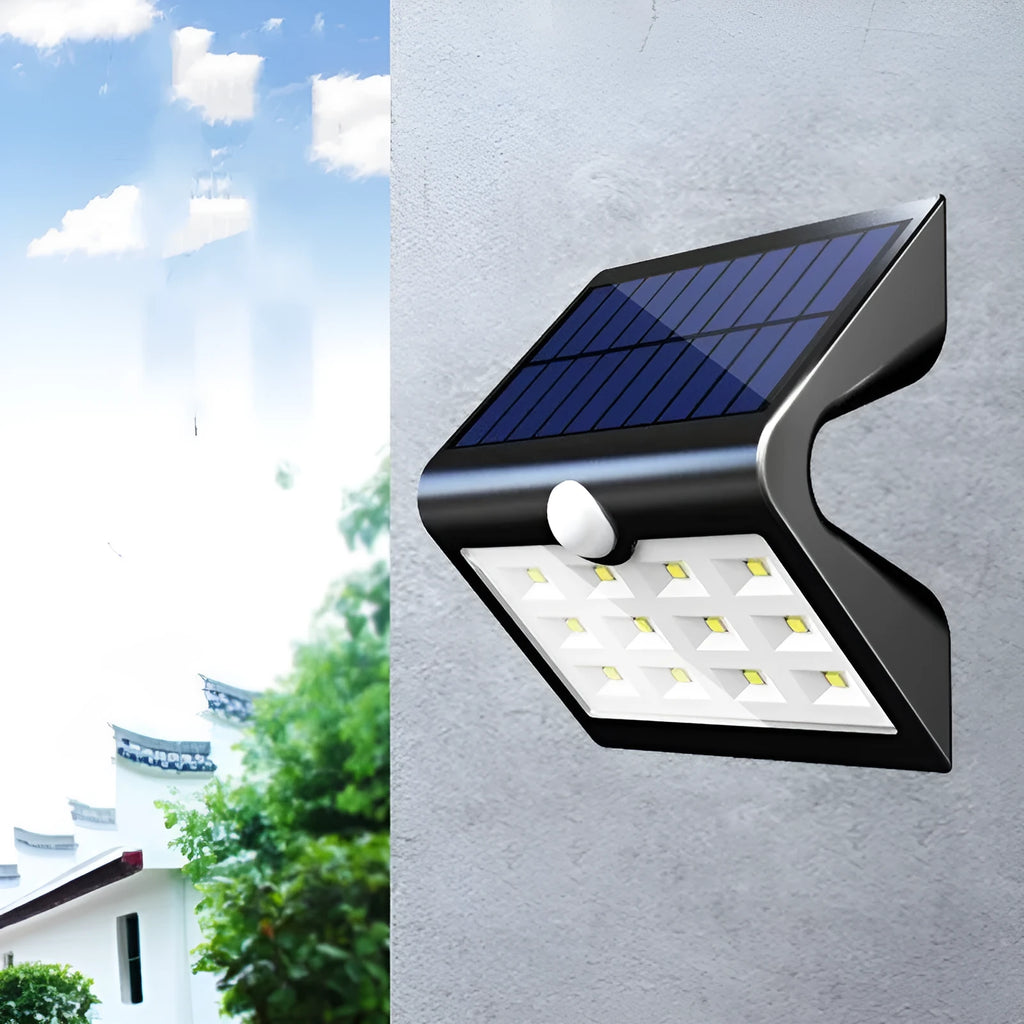 Compact rectangular white solar garden wall light mounted on a fence post.