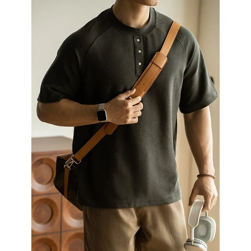 Casual loose pullover top with raglan sleeves in a terry texture fabric, shown in smoky gray colour.