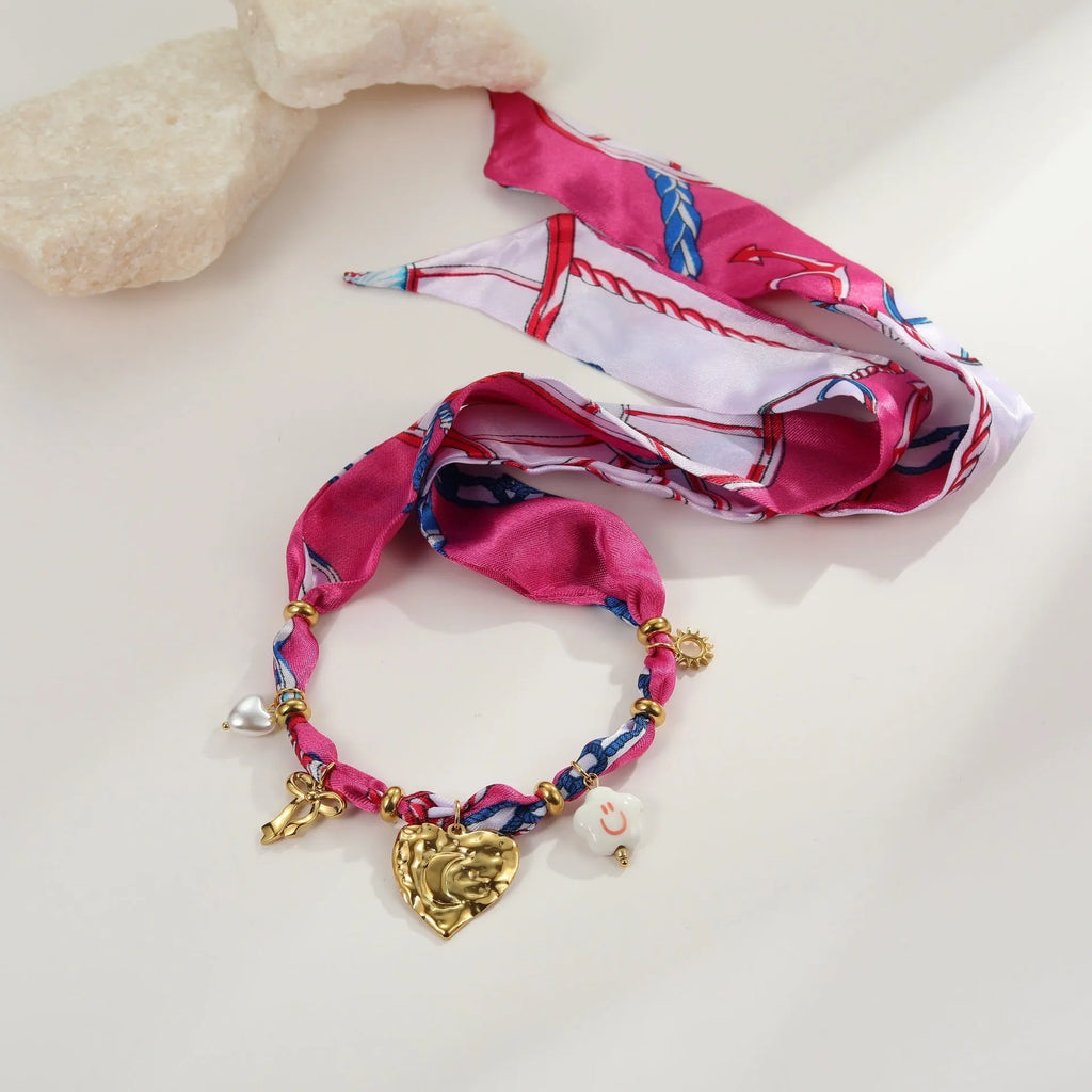 Stainless steel 18K gold plated necklace with geometric pendant and matching bracelet jewellery set