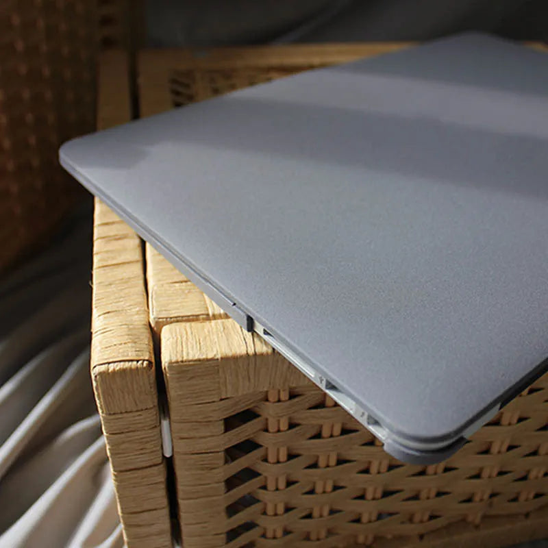Quicksand Cobalt Gray polycarbonate protective shell for MacBook laptop on a desk