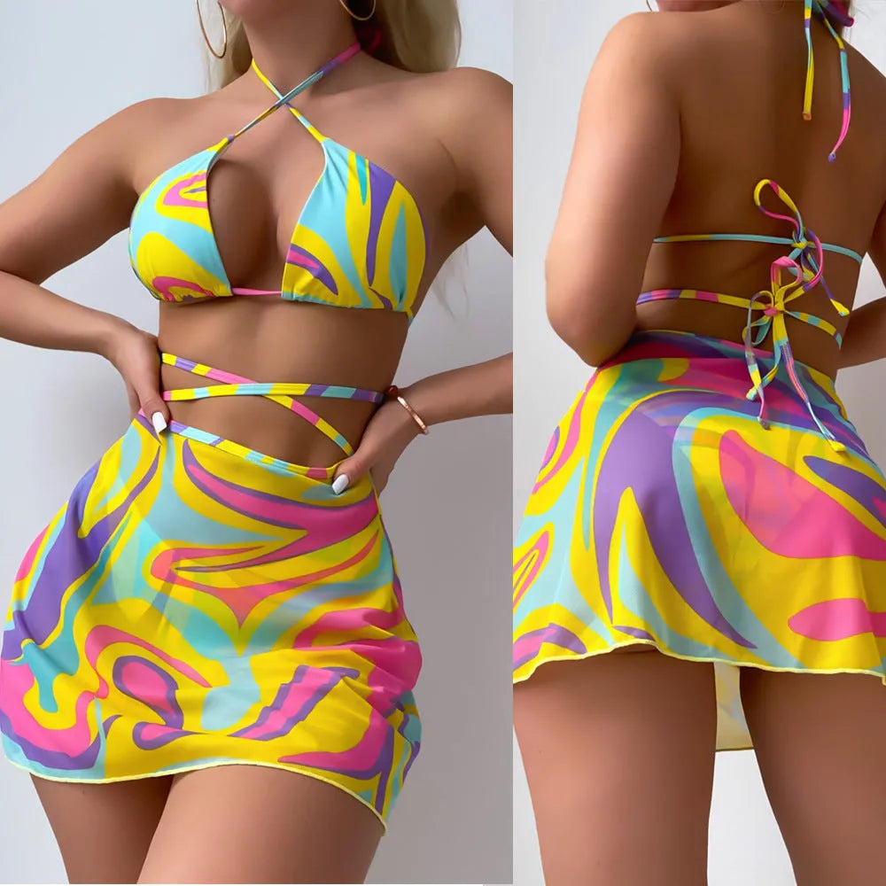 Yellow striped halter-neck lace-up swimsuit top with matching skirt and shorts for women