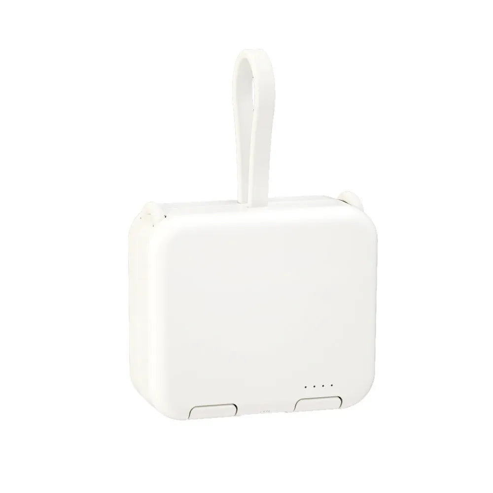 Handbag clip-on portable power bank in blue, shown charging a phone and functioning as a stand.