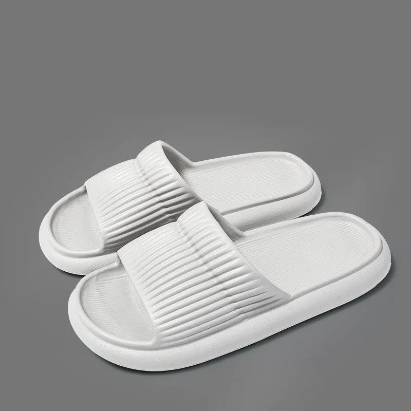 Solid striped EVA non-slip home slippers in grey, one-word style, for women and men