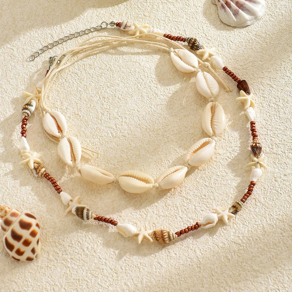 Handmade geometric shell necklace in X1900 colour with bohemian style pendant on regular chain