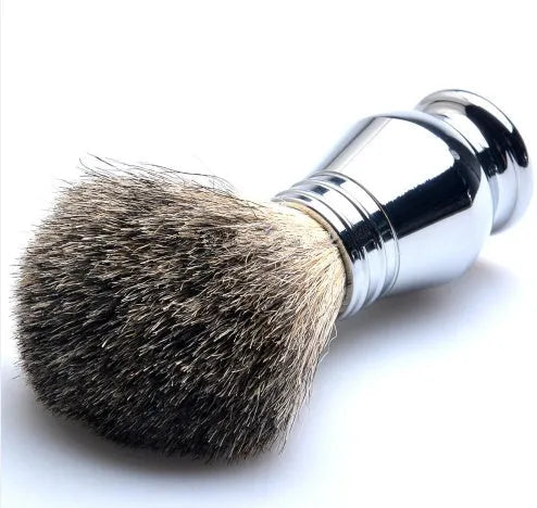 CSB shaving set with chrome safety razor, badger hair brush on stand, zinc soap bowl, blades and black box.