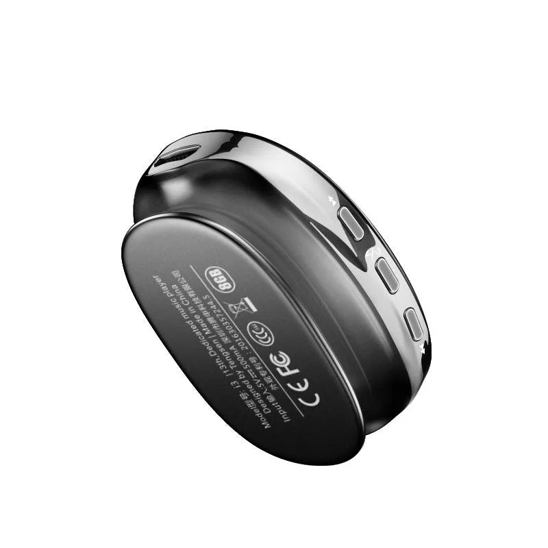 Blue Bluetooth MP4 music player with OLED screen showing track info, beside headphones.