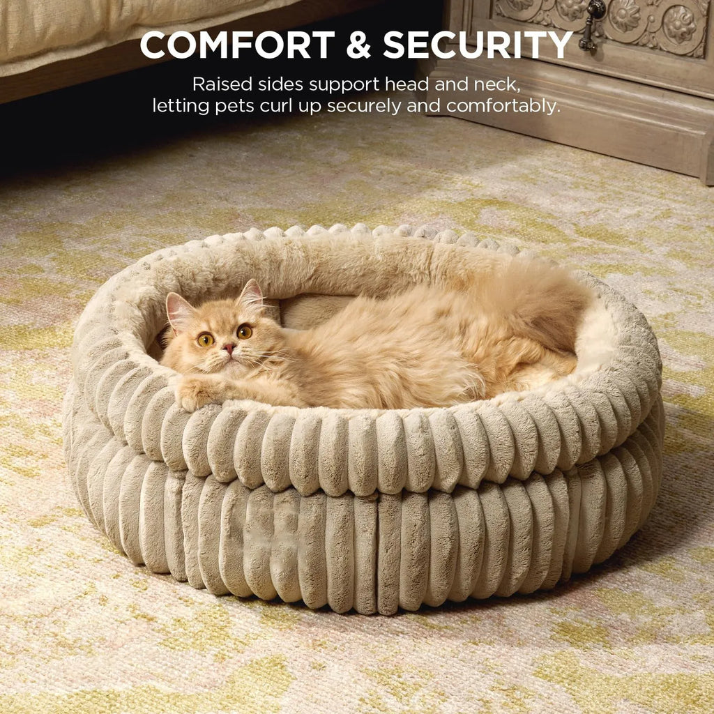 Washable round cat bed in beige with super soft plush faux fur and anti-slip bottom