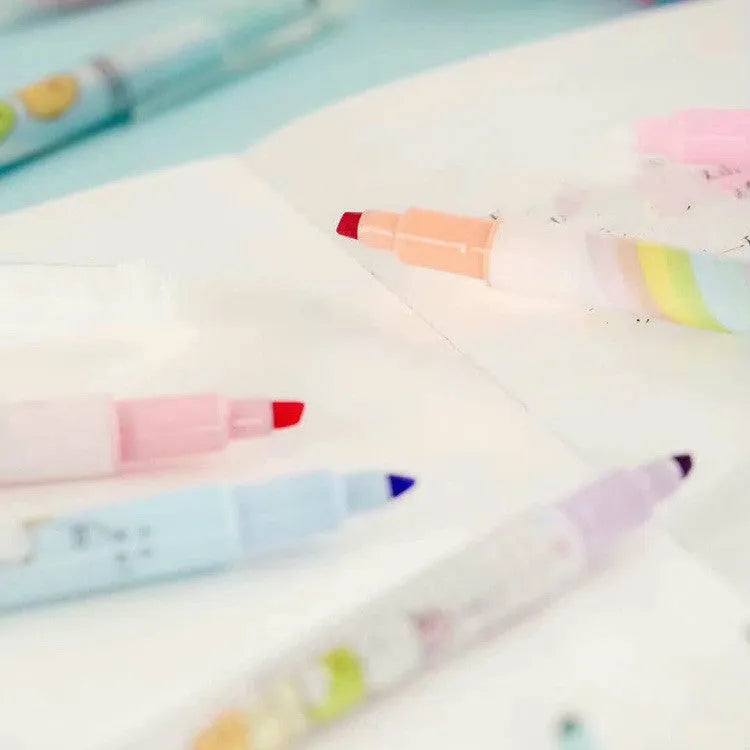 Erasable highlighter pen, plastic body, 16cm length, assorted colours on white background