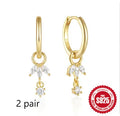 Sterling silver geometric sunflower earrings with golden three diamond zircon accents