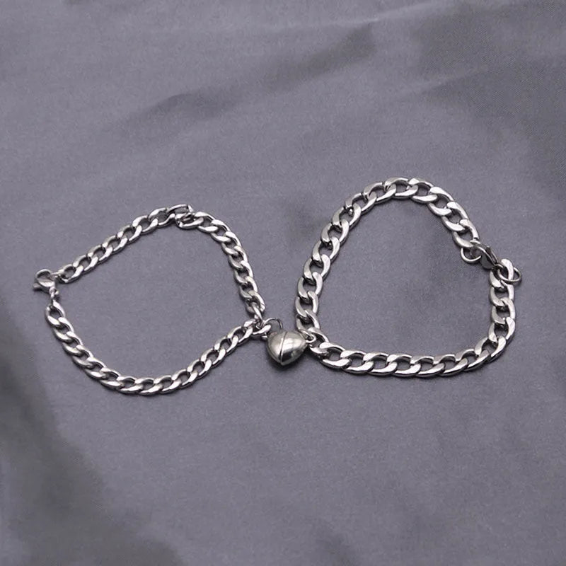 Magnetic couple bracelet set with silver heart charm on stainless steel chain