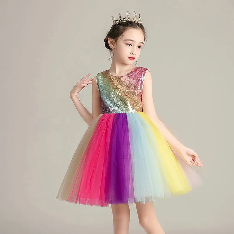 Girls cute rainbow skirt with lace and mesh layers, seven colours, 100% polyester outer, 80% cotton lining, available in sizes up to 160cm