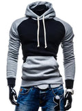 Slim fit hip hop hoodie in black, front view, with ribbed cuffs and hem