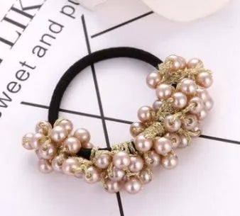 Cloth beaded hair rope in black colour on a white background