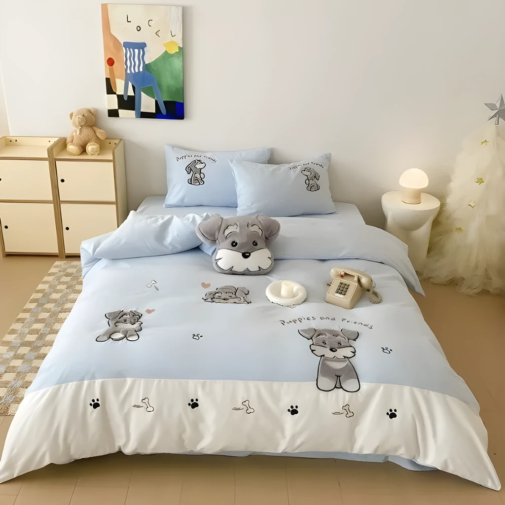 Schnauzer dog cartoon pattern embroidered on a complete thickened cotton bedding set showing quilt cover and pillowcases.