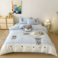 Schnauzer dog cartoon pattern embroidered on a complete thickened cotton bedding set showing quilt cover and pillowcases.