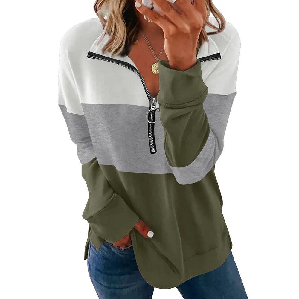 Women's loose fit leopard print long sleeve pullover sweater on a hanger