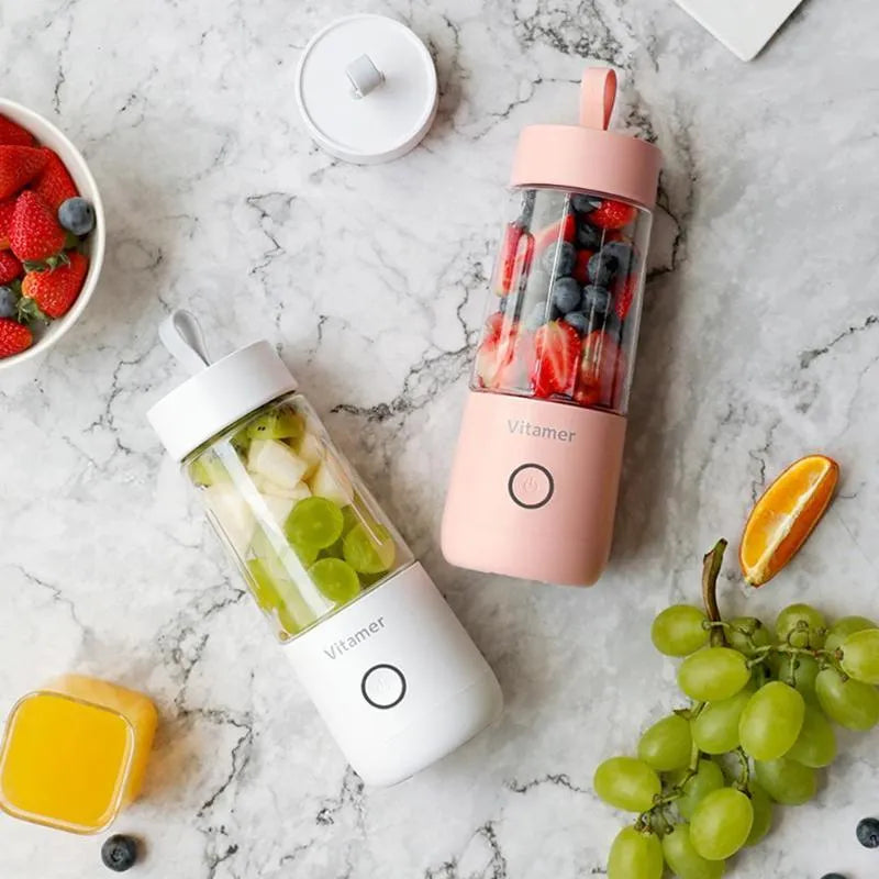 Dreamer Juice Cup portable blender in pink and white with 350ml capacity and stainless steel blade