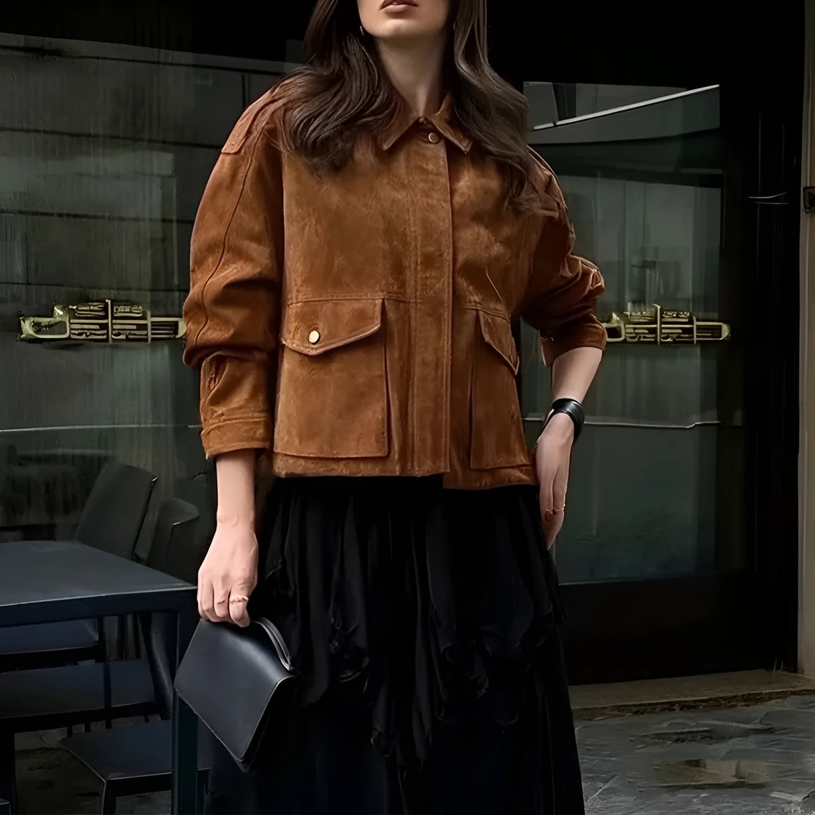 Brown suede-look polyester women's coat with regular sleeves on a hanger.