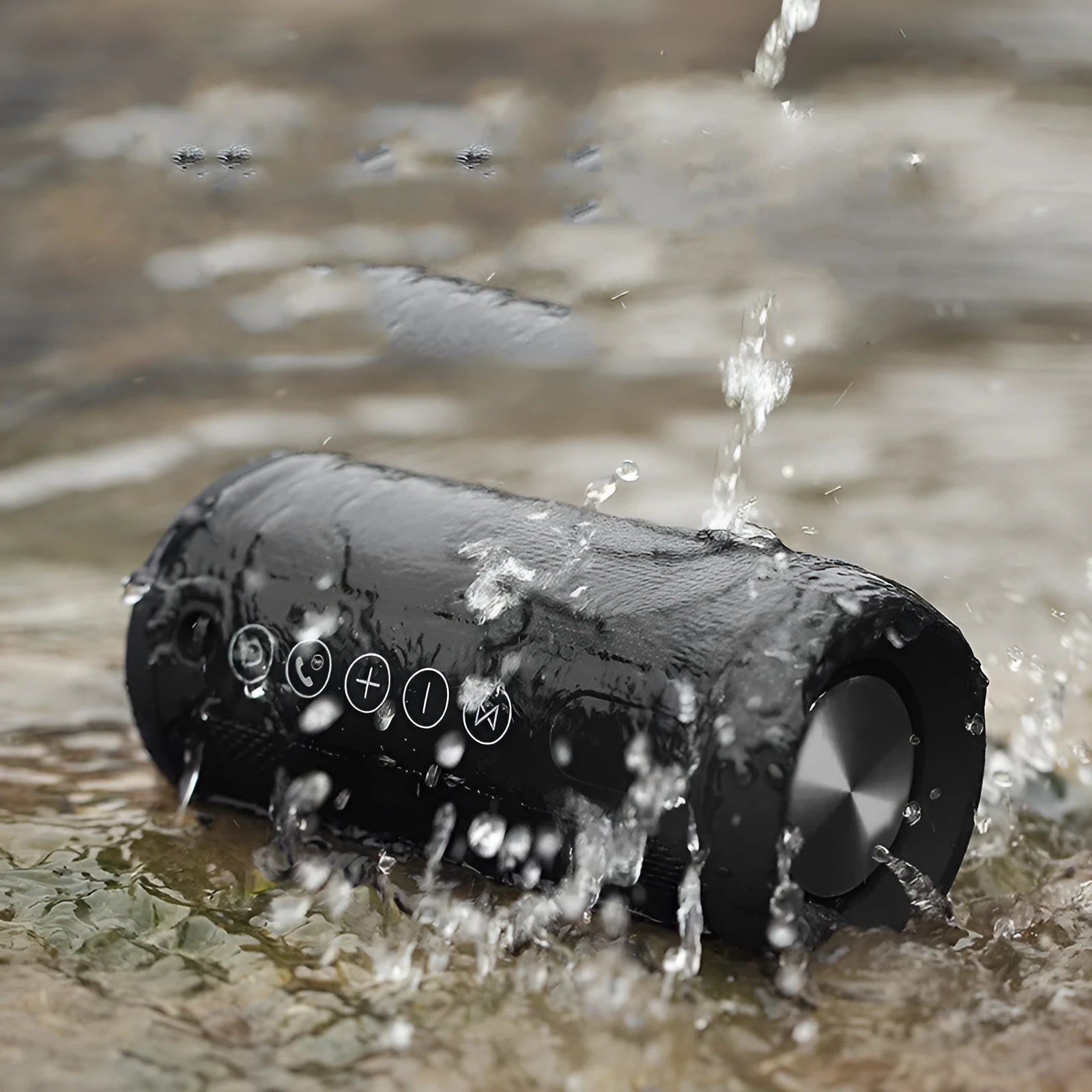 Compact portable outdoor Bluetooth speaker in black, showing control buttons and a speaker grille.