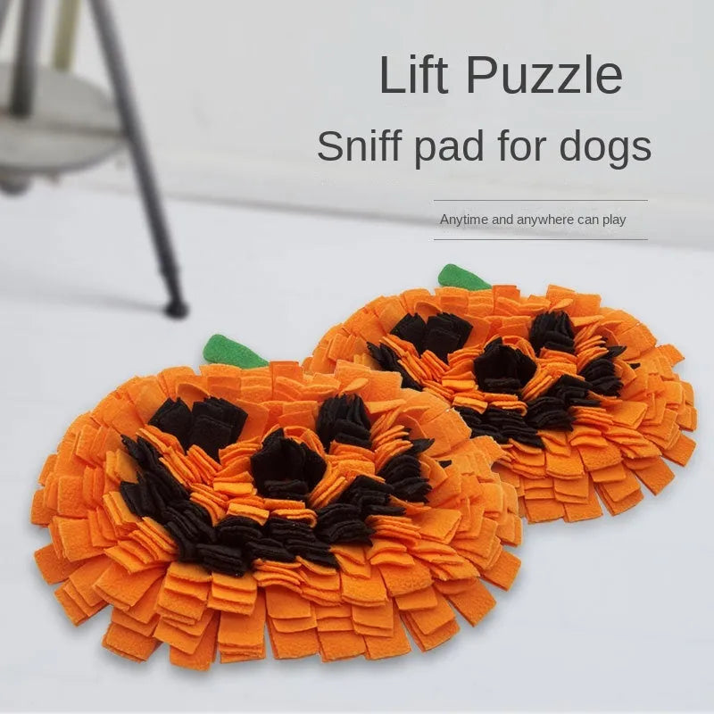 Orange pumpkin-shaped dog sniffing mat with raised fur texture for slow feeding