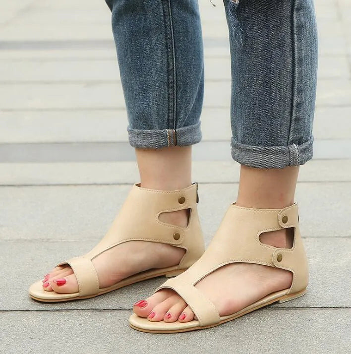 Flat sandals with artificial PU upper, round toe, flat heel, in beige colour