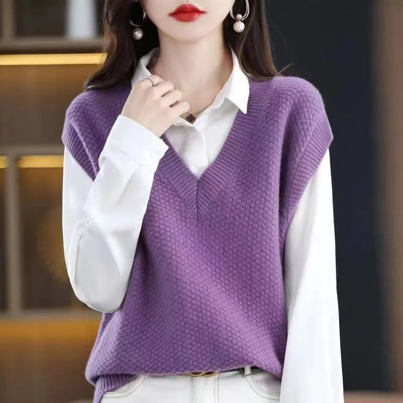 V-neck sleeveless knitted vest with 3D effect pattern available in multiple colours