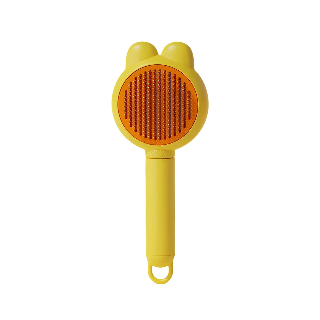 Self-cleaning pet grooming brush with release button in green, pink, purple or yellow colour options