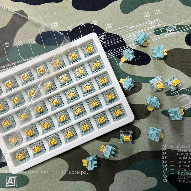 Pack of 36 Sea Salt Lemon coloured Tiger Mo PRO mute mechanical keyboard switches.