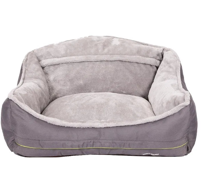 Grey dog bed sofa bed with raised edges and foam padding in XL size