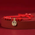 Cinnabar braided rope bracelet with traditional blessing card in ethnic style for unisex wear