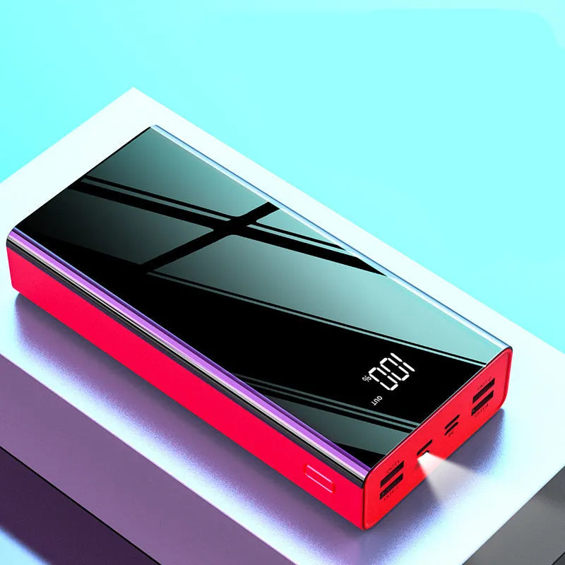 Black and red large 40000mAh power bank with LCD display screen showing battery percentage.