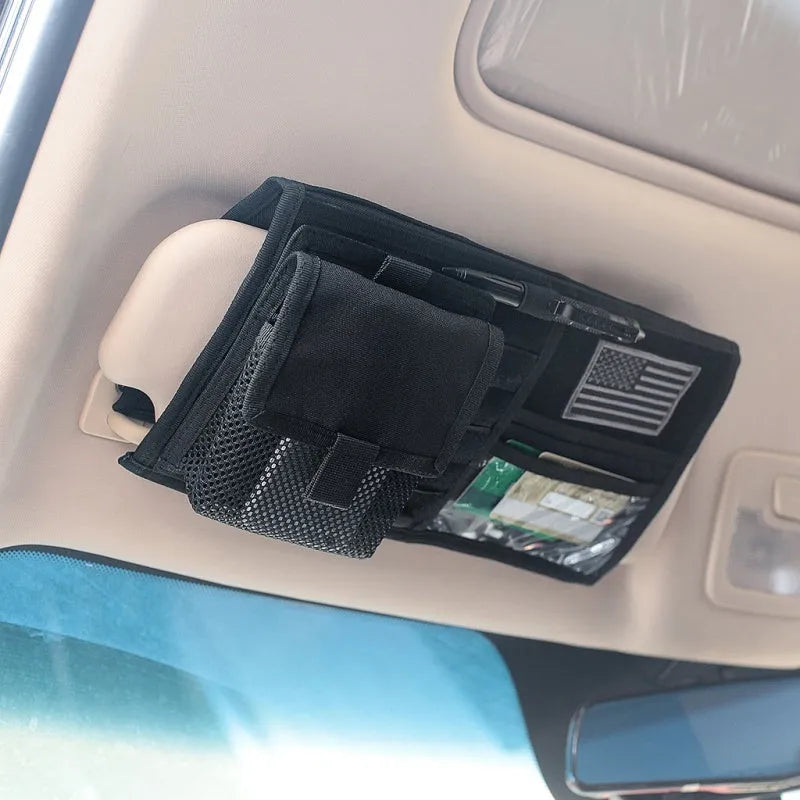 Black 1000D nylon car sun visor organizer measuring 36x35cm with storage compartments