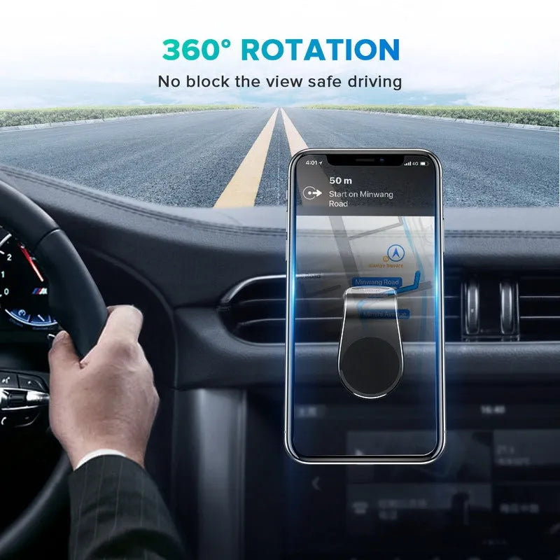 Black universal car phone holder bracket mounted on a car dashboard holding a smartphone.