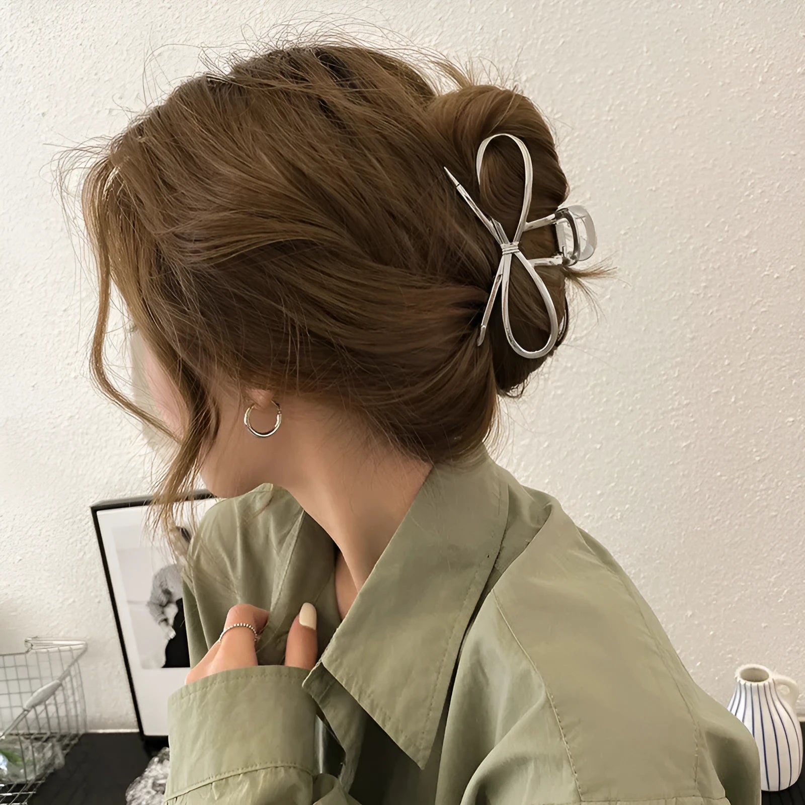 Gold bow barrette hair grip with alloy construction and decorative design