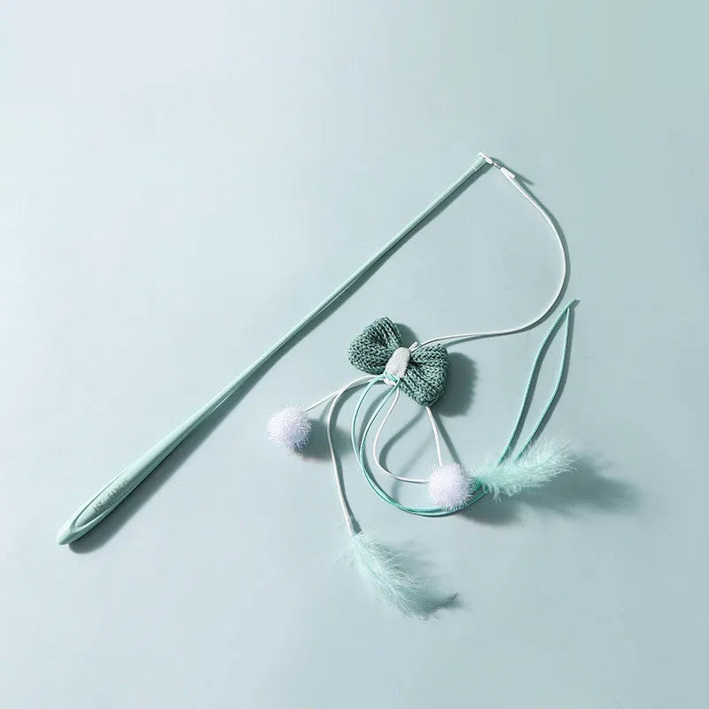 Blue cat teaser toy with feather attachments on long bite-resistant pole for interactive play