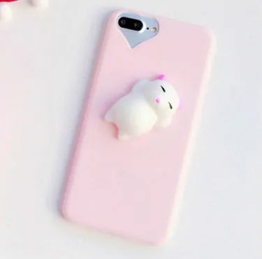 Soft silicone TPU iPhone case with a 3D cartoon cat design, shown in pink.