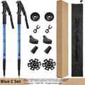 Aluminium alloy adjustable trekking pole extended to full length with mud support accessory attached