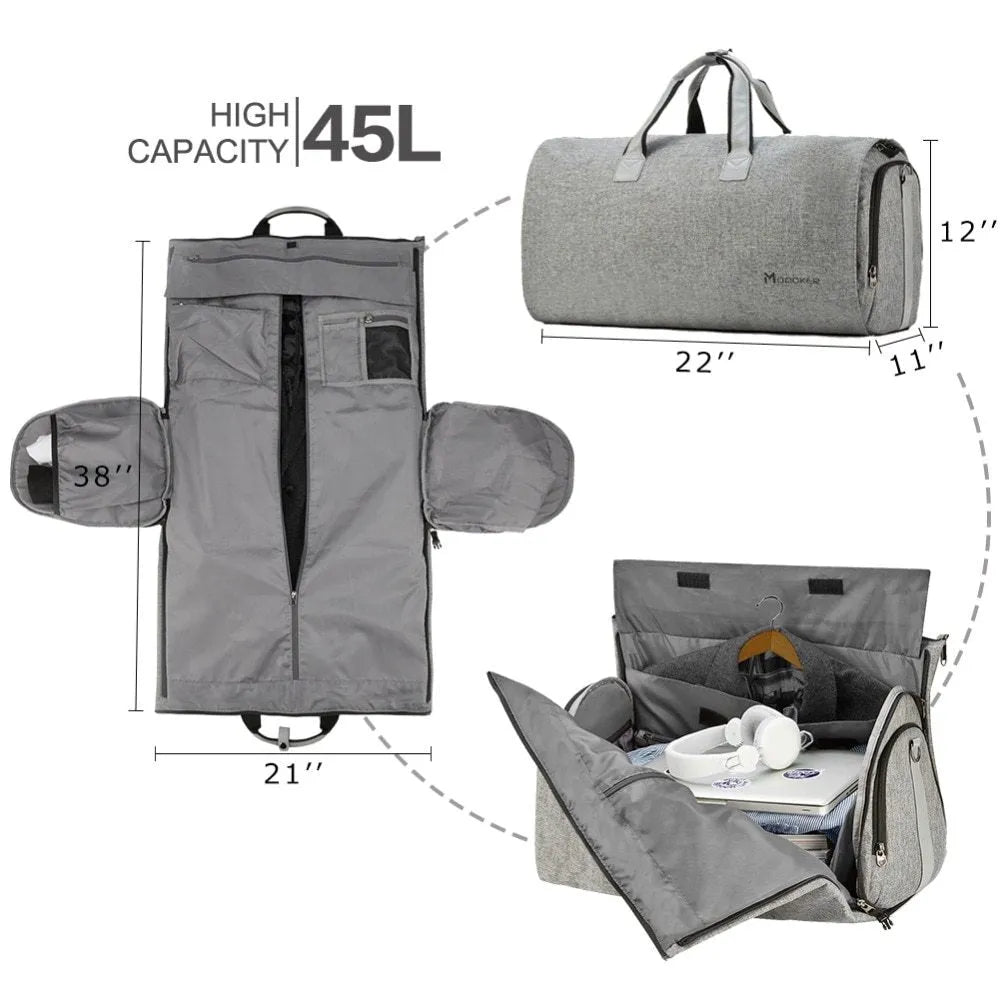 Travel garment bag in black and gray with adjustable shoulder strap, hanging suit carrier, and multiple pockets on a neutral background