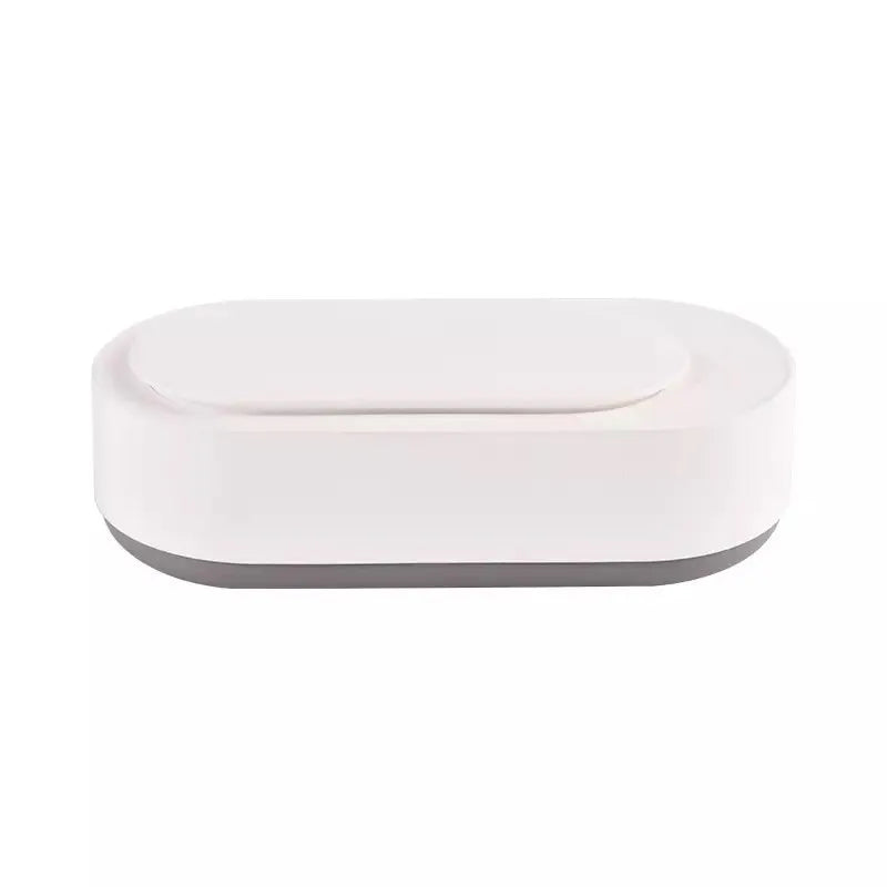 White portable ultrasonic cleaning machine with stainless steel tank and digital timer display.