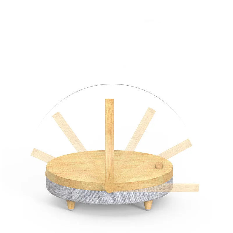 Wireless charging pad with integrated LED night light and Bluetooth speaker in marble pattern finish