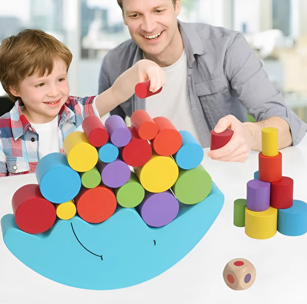 Yellow and blue moon-themed wooden balance game toy for toddlers on a white background.