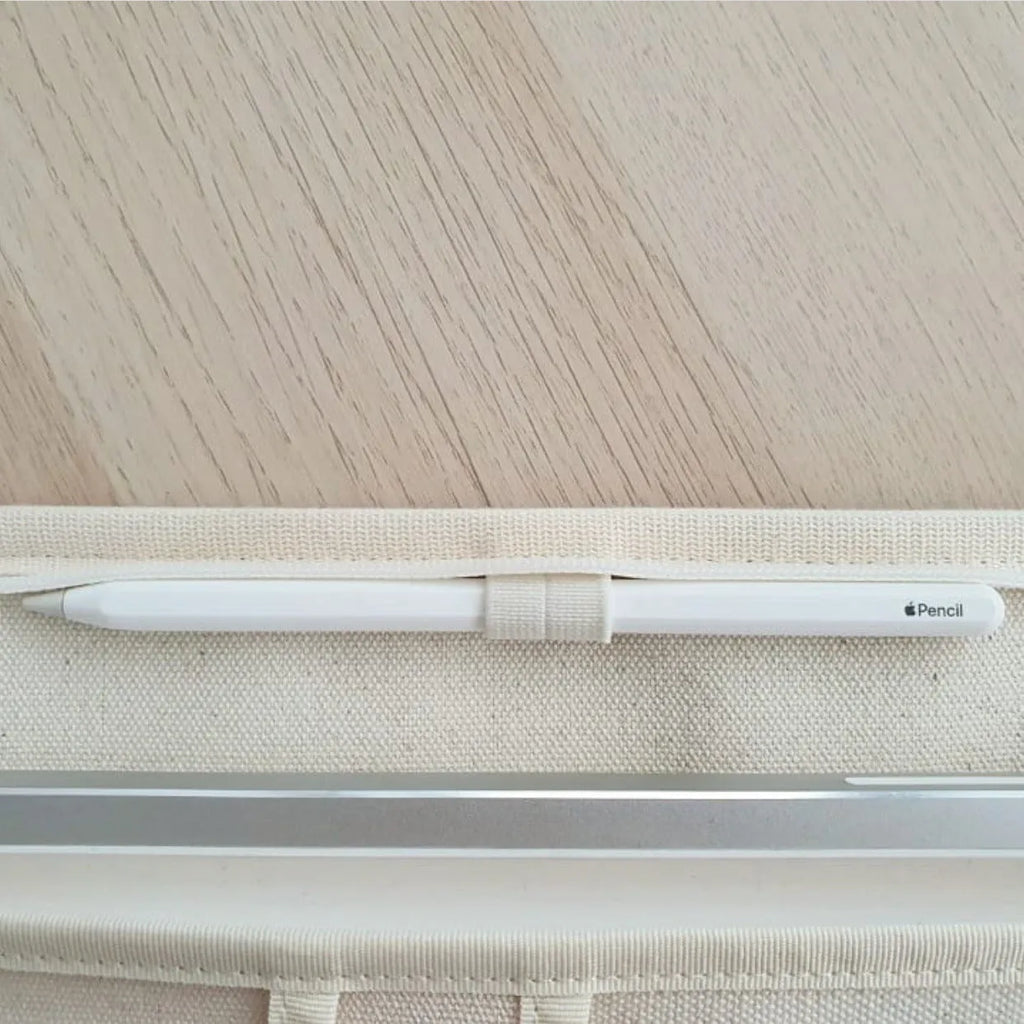 Canvas tablet storage bag with zipper opening and soft handle designed for 12-inch devices, shown in black and white colours