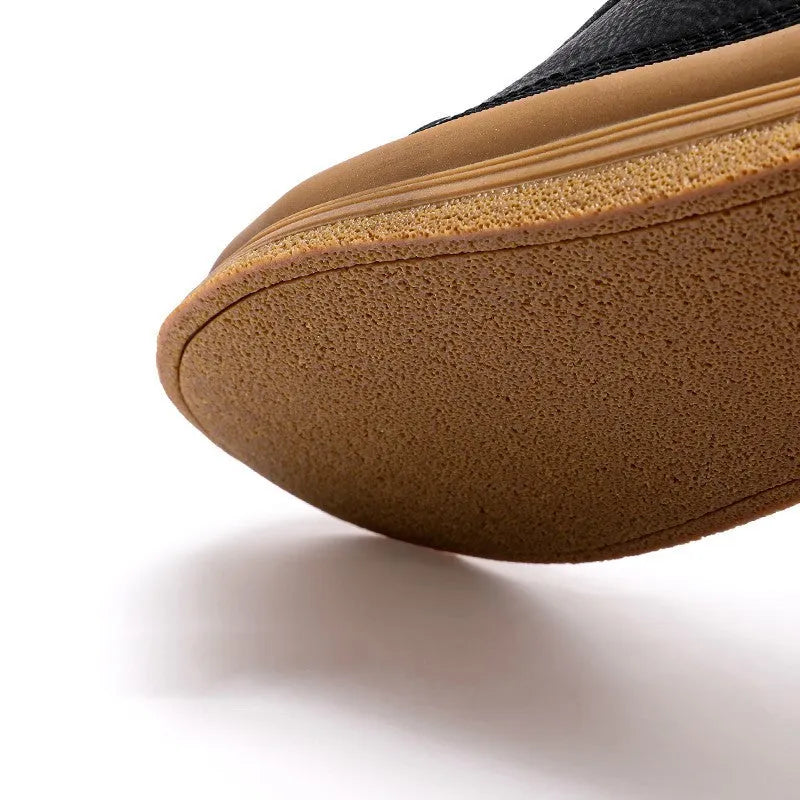 Black men's leather lace-up casual shoes with a round toe and flat rubber sole.